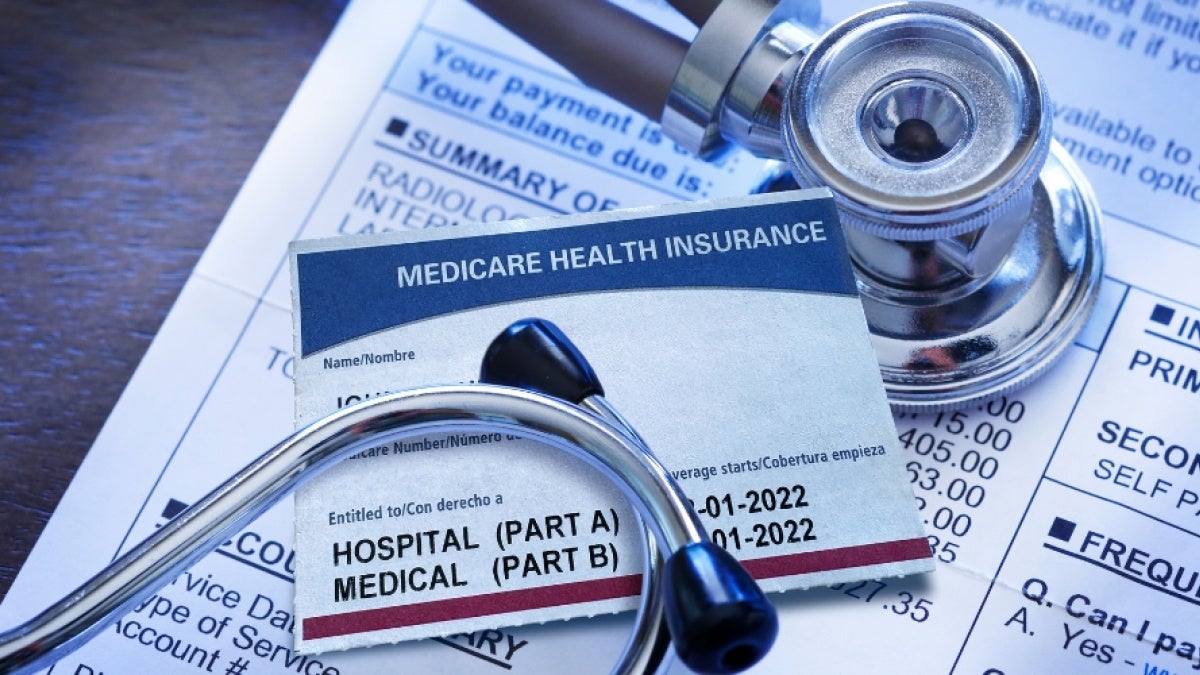 Close up of a stethoscope on Medicare insurance forms 
