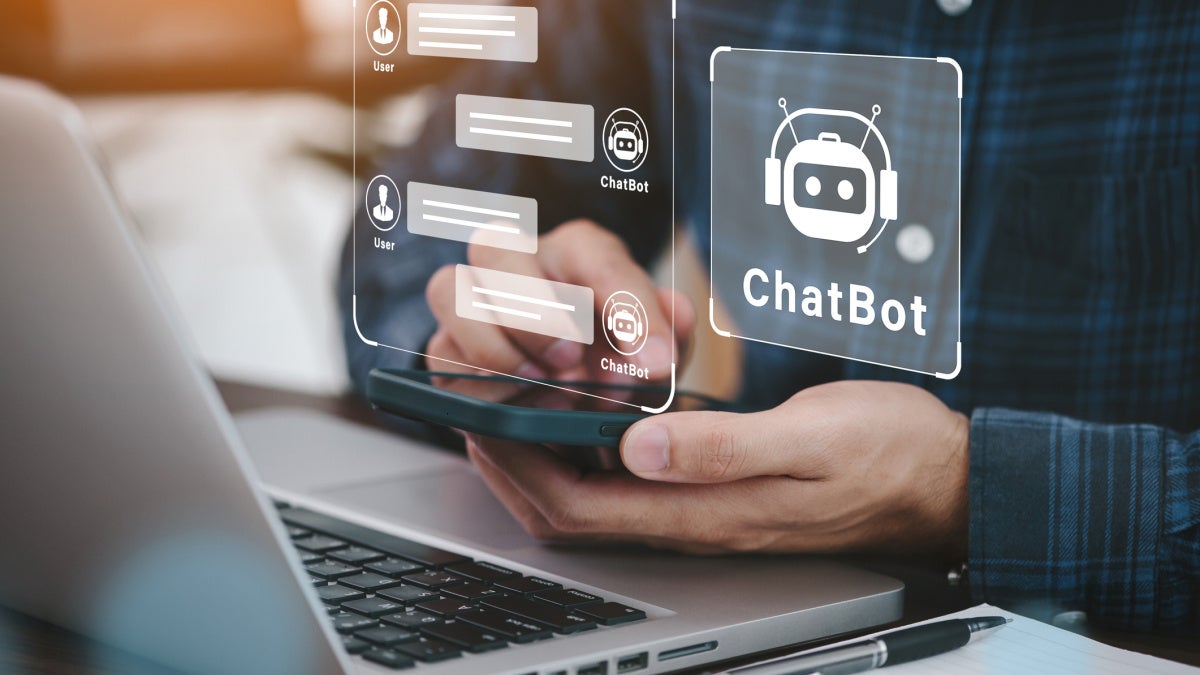 Image of a male chatting with an AI chatbot