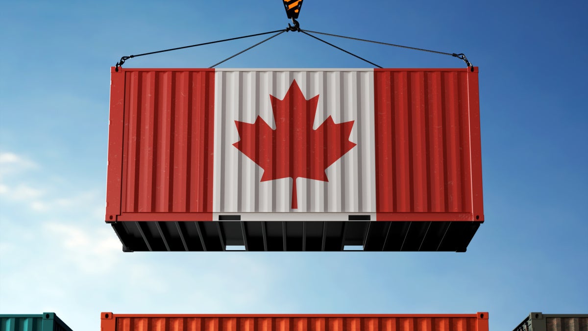 Image of a shipment container painted in Canadian flag