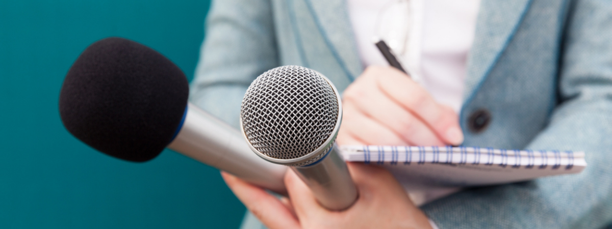 reporter%20with%20microphone_1.png