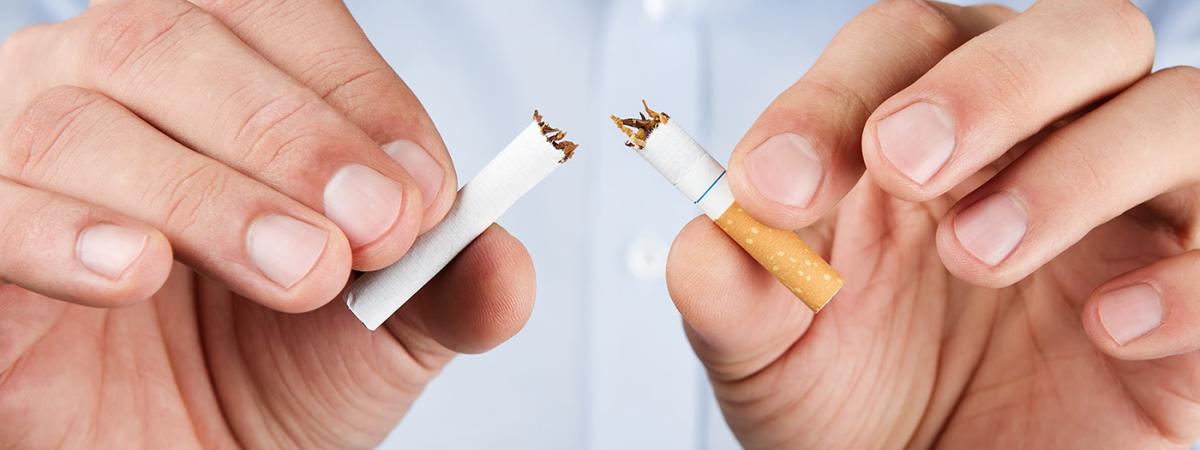 man-breaking-cigarette