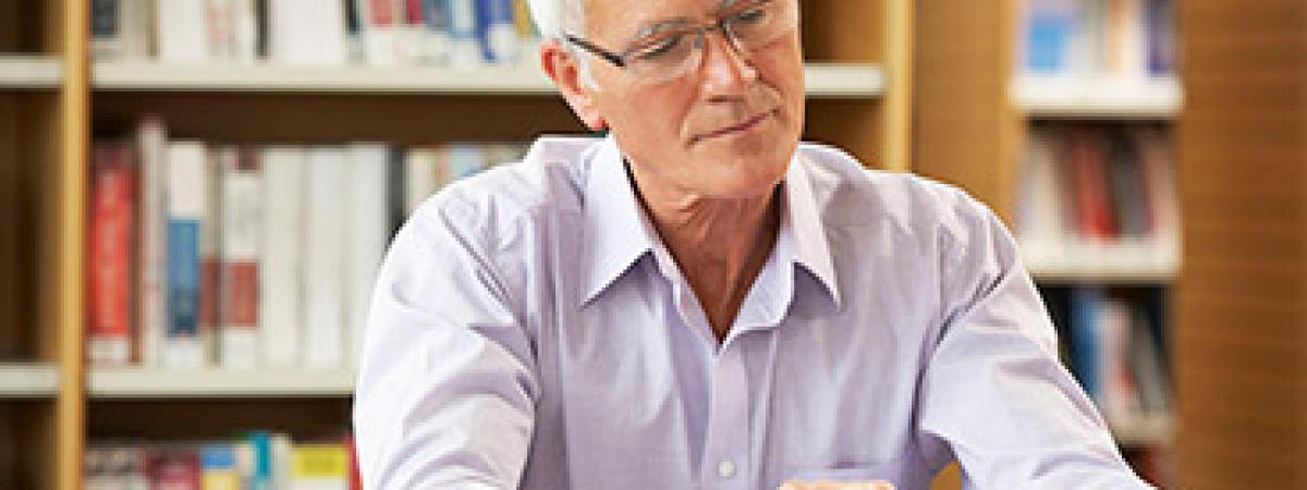senior-male-with-book
