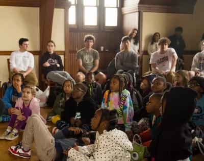 Kwame Alexander, a best-selling author and Emmy-winning producer, read to elementary-school children and Case Western Reserve students participating in the Book Buddies program that CWRU faculty member Cara Byrne leads. The university’s Baker-Nord Institute for the Humanities organized this campus event when it brought Alexander to campus for Awe, the Cleveland Humanities Festival held in 2024.