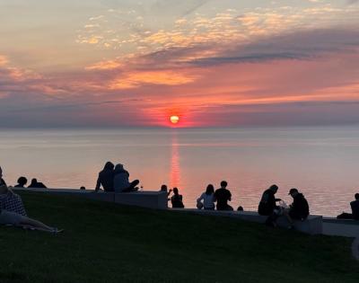The sun sets gently over the Solstice Steps in nearby Lakewood. Photo by Lex Ehrenschwender.