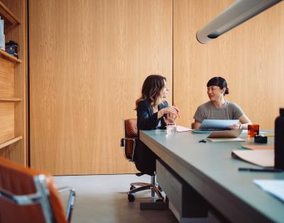 two female Entrepreneurs sitting at a table