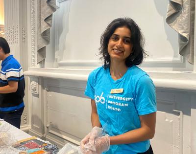 Harini Ganapathy assists at a volunteering event with the University Program Board.