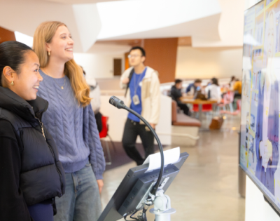 Students engaging with the lobby avatar screen