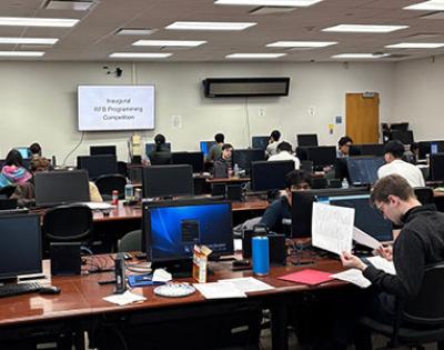 Students in a computer lab compete in the final round of the inaugural RFB Programming Competition