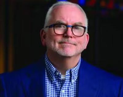 Rex Tibbons headshot