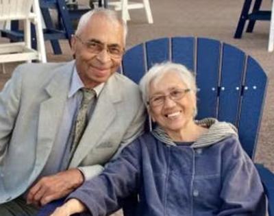 Shyam and Kalindi Pathak seated outside