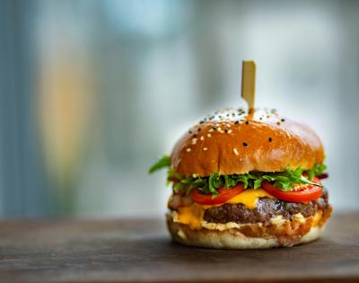 image of burger sitting on table