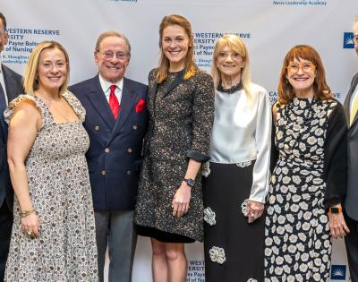 Case Western Reserve University donors, professors and administrators pose at an event for the nursing school