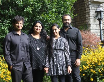 A family poses for a group photo