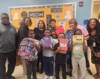 Staff members of Project STEP-UP partner with the CWRU Staff Advisory Council to donate supplies to students of Daniel E. Morgan School. 