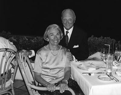 Milton and Roslyn Wolf pictured at dinner in a black and white photo