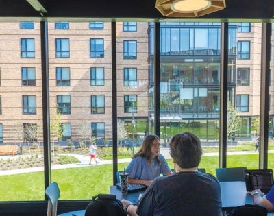 Students in new South Residential Village building.