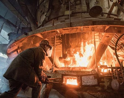 Man processing steel.