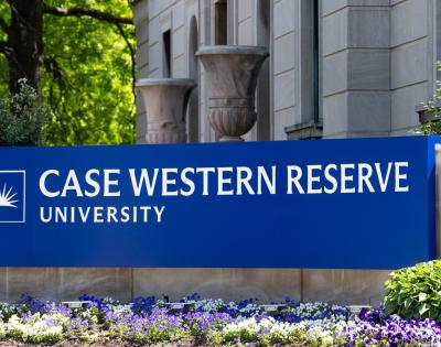 Bright blue sign reading "Case Western Reserve University"
