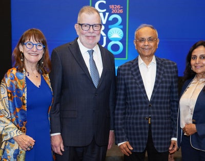 Mrs. Karen F. Kaler and President Eric W. Kaler posing with Shailesh and Kalpa Mehta at the bicentennial event in Mumbai.