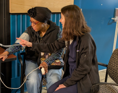 CWRU medical student takes the blood pressure of a community member at a CentroVilla25