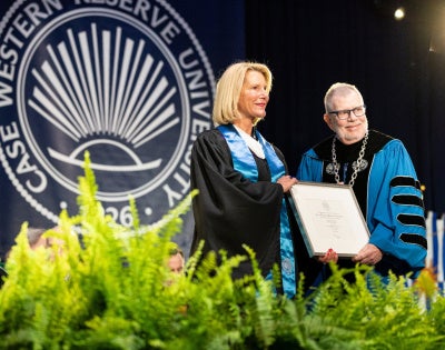 Ellen Mavec (pictured left) receives CWRU's President's Award for Visionary Achievement from President Eric W. Kaler.