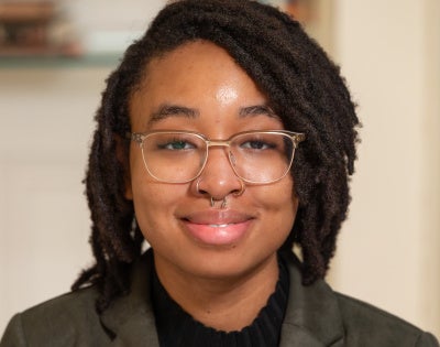Headshot of LaNaya Terry wearing a gray jacket and black shirt