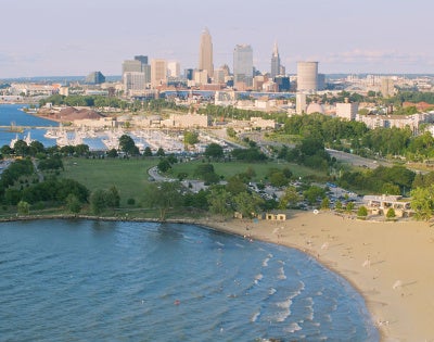 Aerial photo overlooking Edgewater Beach and the Cleveland skyline in the background