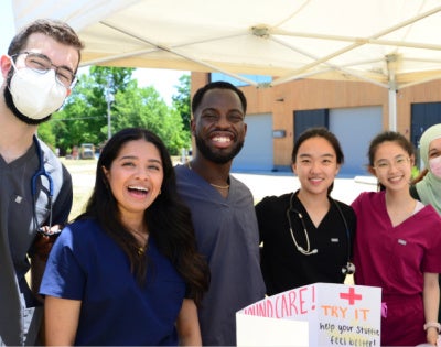 CWRU School of Medicine students staff the Teddy Bear Clinic at Case Comprehesnive Cancer Center’s Black Family Cancer Awareness event