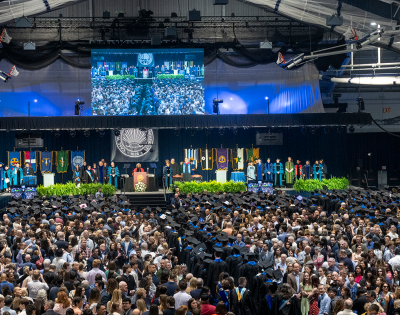 Aerial view of the stage and audience at the undergraduate commencement ceremony