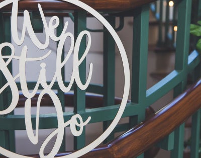 "We still do" sign from the vow renewal event