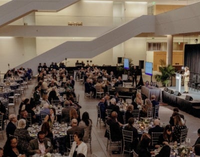 Tables of people at homecoming event