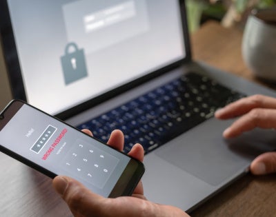 Image of a laptop and phone with password protection