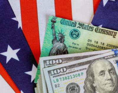U.S. money with U.S. flag