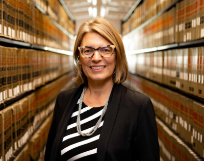 Jessie Hill photographed in a library