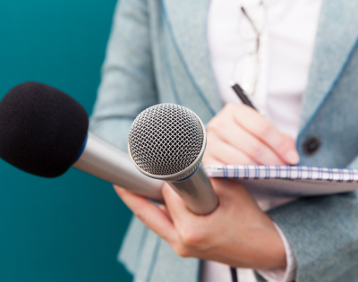 reporter%20with%20microphone_1.png