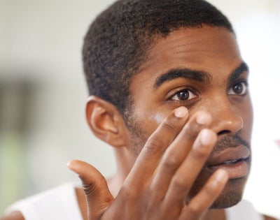 guy-checking-skin