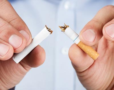 man-breaking-cigarette