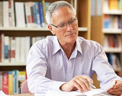 senior-male-with-book