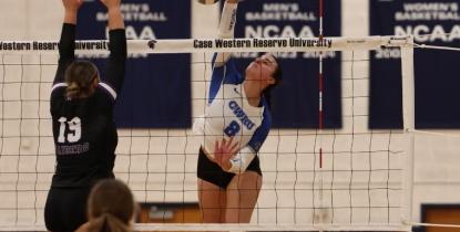 Kalli Wall playing volleyball.