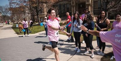 Students running in the Hudson Relays