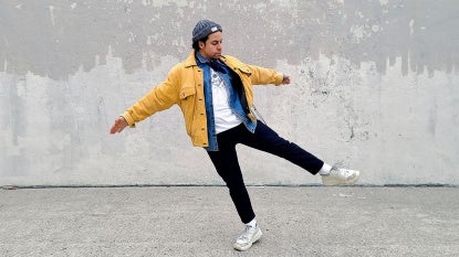 Chris Bell dancing in an urban environment