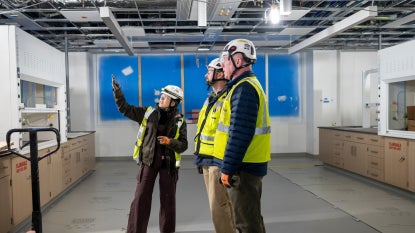 Abigail Mondragon, Philip Polito and Jack Kellogg at the construction site of the Interdisciplinary Science and Engineering Building. Photography by Nancy Andrews.
