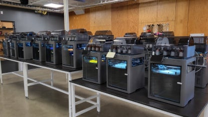 Fleet of high-speed Bambu X2C printers at Sears think[box]. 