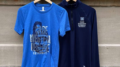 View of new t-shirt and quarter-zip for September 2026 Blue CWRU sale.