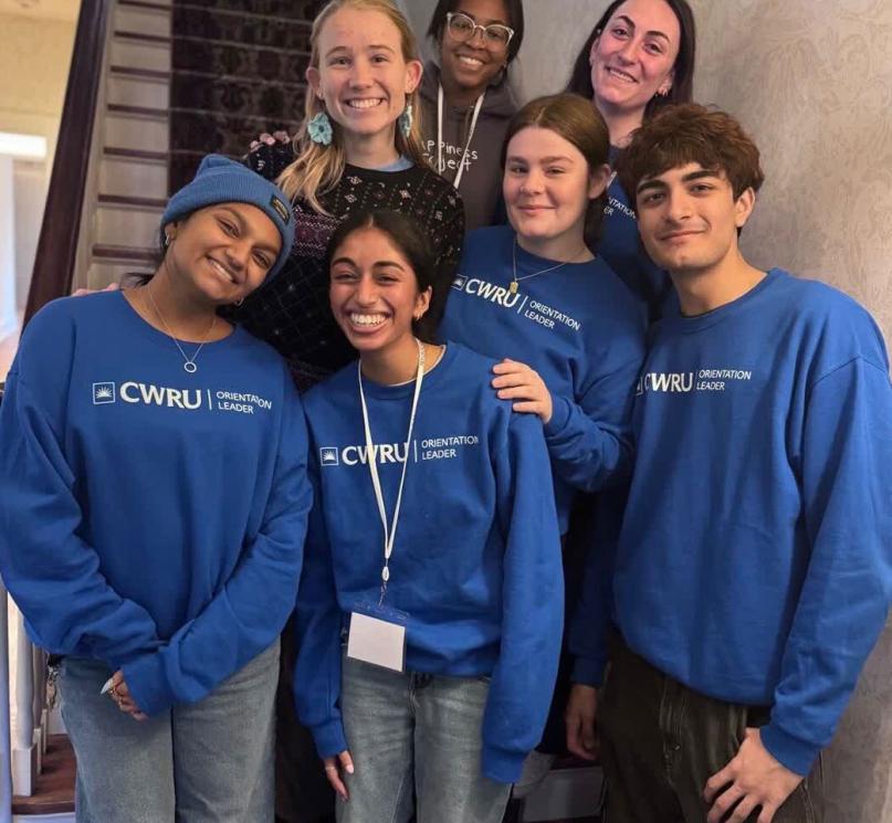 Seven orientation leaders pose for a photo. 