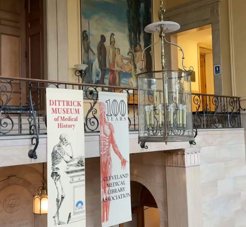 A balcony with banners inside the Allen Memorial Medical Library.