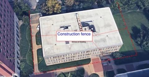 Photo of the south side of the Nursing Research Building showing where construction fencing will be placed.
