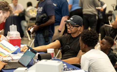community member receiving health screenings