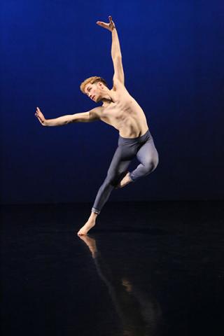 Photo of Joel Linebach mid-leap during a dance with his arms out