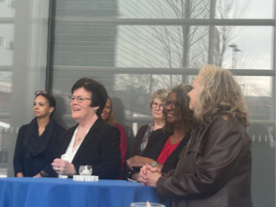 Mary Quinn Griffin, Betty Napoleon and Chris Winkelman sit at their retirement party